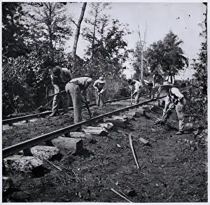 Men Rebuilding Railroad