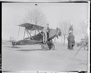 Men Refueling an Airplane From Fuel Pump