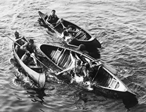 Paddling Prints: Men rowing
