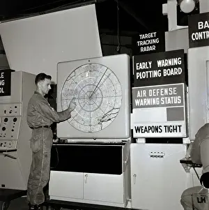 Instrument Panel Prints: Men Seated At Missile Console Working