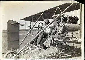 Biplane Prints: Men Seated In Plane