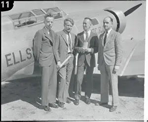 Men Standing in Front of Plane