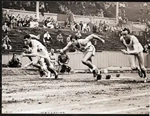 Men Starting 100 Meter Track Race
