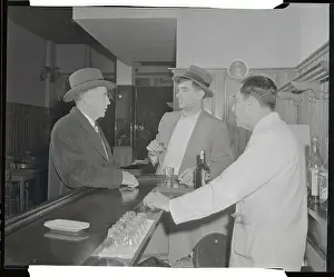 Men Talking at Bar