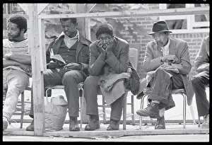 Men Waiting in Line