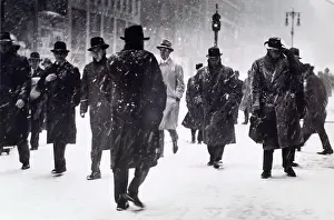 Prints of MEN WALK ALONG SNOWY STREETS, NEW YORK CITY Celebrate the Season: A Curated Collection of Christmas Art: MEN WALK ALONG SNOWY STREETS, NEW YORK CITY
