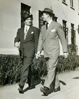 Sidewalk Prints: Two men walking along sidewalk