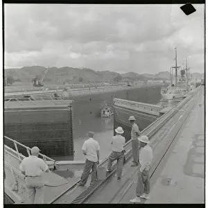 Canal Zone Prints: Men Watching Ships Entering Canal Lock