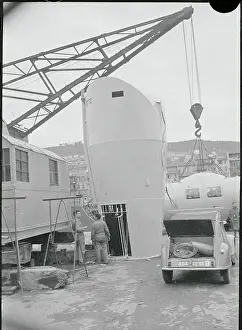 Men Watching Underwater House