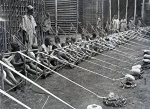 West Prints: Men Weaving Using Handlooms