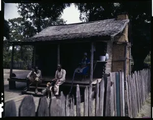 Alabama Prints: Two Men and Woman Sitting on Shack Porch