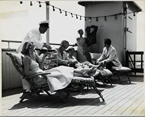 Sunshine Prints: Men and Women on Boat Deck