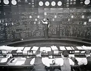 Number Prints: Men Work at Control Board at Electric Company