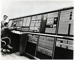 Men Work @ Huge Computer Operating Syste