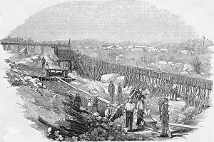 Shovel Prints: Men at Work Site with Shovels