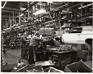 Men Working on Auto Assembly Line