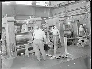 Men Working with Automobile Sheets