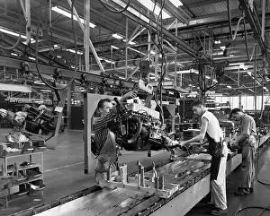 Automobile Mechanic Prints: Men Working on Engine in Assembly Plant