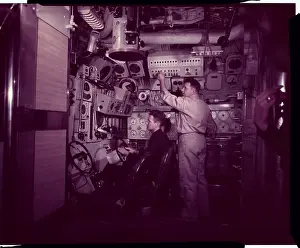 Men Working in Interior of Submarine