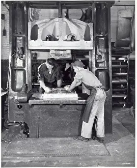 Heavy Prints: Men Working On A Press; Heavy Equipment