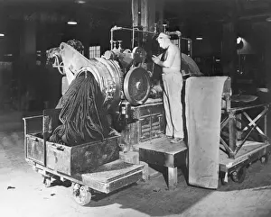 Men Working with Rubber Tires for Reusing Process
