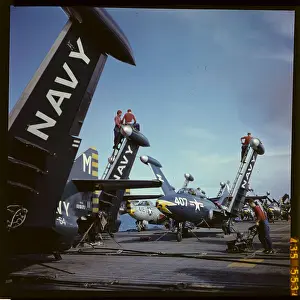 Men Working on U.S. Aircraft Carrier Patrolling in Formosa Straits