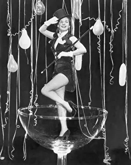 Champagne Prints: Mercedes McCambridge Greeting the New Year