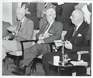 Merrill Meigs Sitting With Colleagues