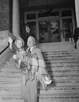 Poliomyelitis Prints: Mia Farrow Being Carried by Her Father From Hospital
