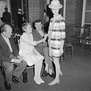 Mia Farrow Reaching to Touch Fashion Worn by Mannequin