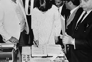 Mia Farrow Signing Divorce Document