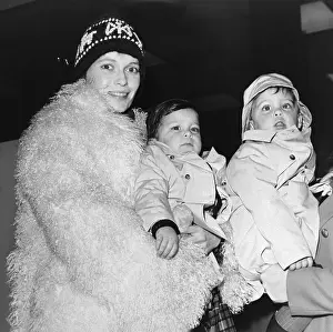 Mia Farrow with Her Small Children at Airport Before Leaving for Flight