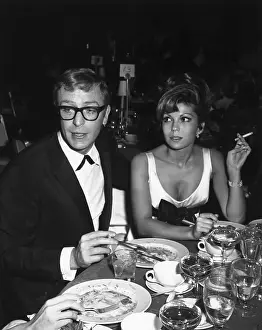 Couples Prints: Michael Caine and Nancy Sinatra at Dinner