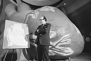 Michael E Prints: Michael DeBakey With Arms Folded and Gazing at Chart