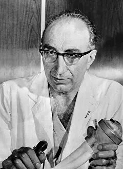 Surgeon Prints: Michael DeBakey Holding Artificial Heart