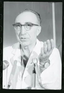 Michael E Prints: Michael DeBakey Speaking at Microphones