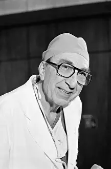 Michael DeBakey and Visitor Watching Open Heart Surgery