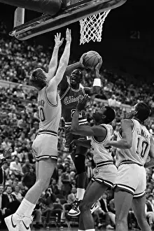 Michael Jordan Going to Basket Encounters Opposition