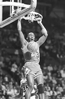 Michael Jordan Hanging on Rim After Slam Dunk