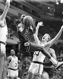 Michael Jordan Jumping Over Larry Bird to Score