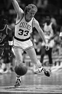 Michael Jordan and Larry Bird Chase After Ball