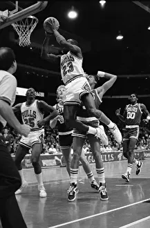 Michael Jordan Leaping to Make Shot