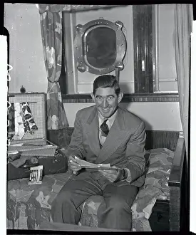 Mickey Cochrane Sitting Aboard Ocean Liner