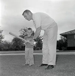 Quality Time Prints: Mickey Mantle Holding Bat with Son