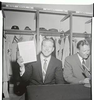 Mickey Mantle Holding Contract in His Hand