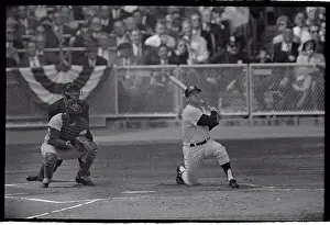 Mickey Mantle Kneeling with Baseball Bat