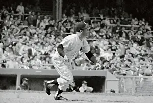 Mickey Mantle Losing Grip of Bat to Run