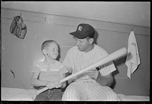 Mickey Mantle Sitting with His Son Mickey Jr
