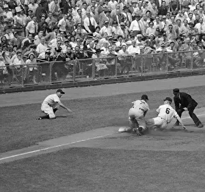 Mickey Mantle Sliding into Third Base