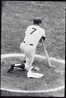 Mickey Mantle Stooping with Baseball Bat